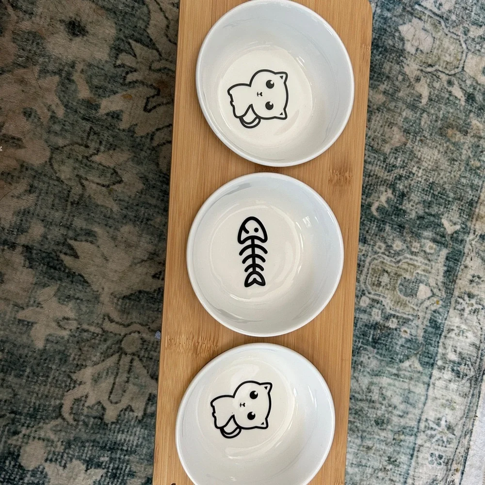 White Ceramic Cat Bowls on Bamboo Tray